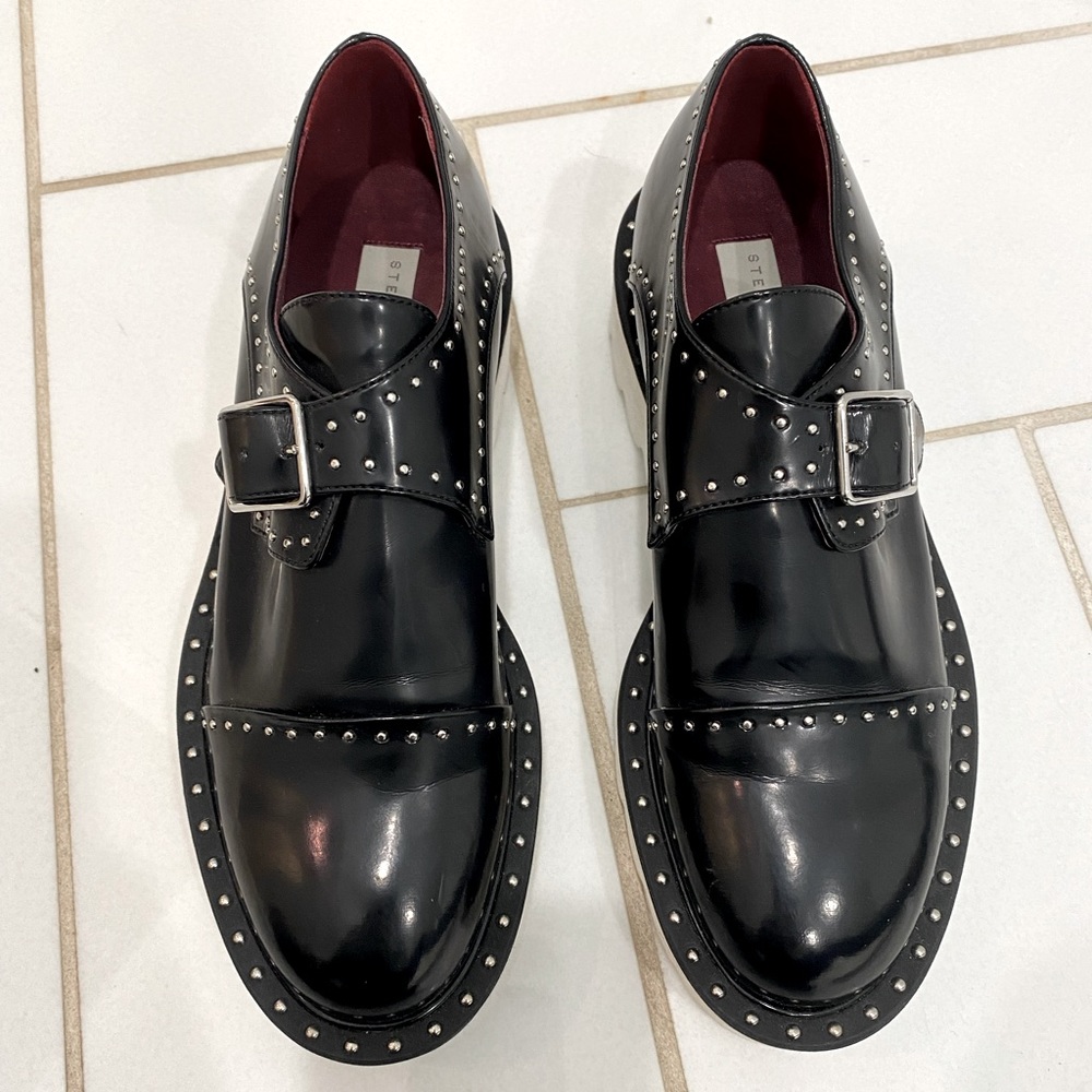 Stella McCartney Odette studded faux glossed-leather brogues in black